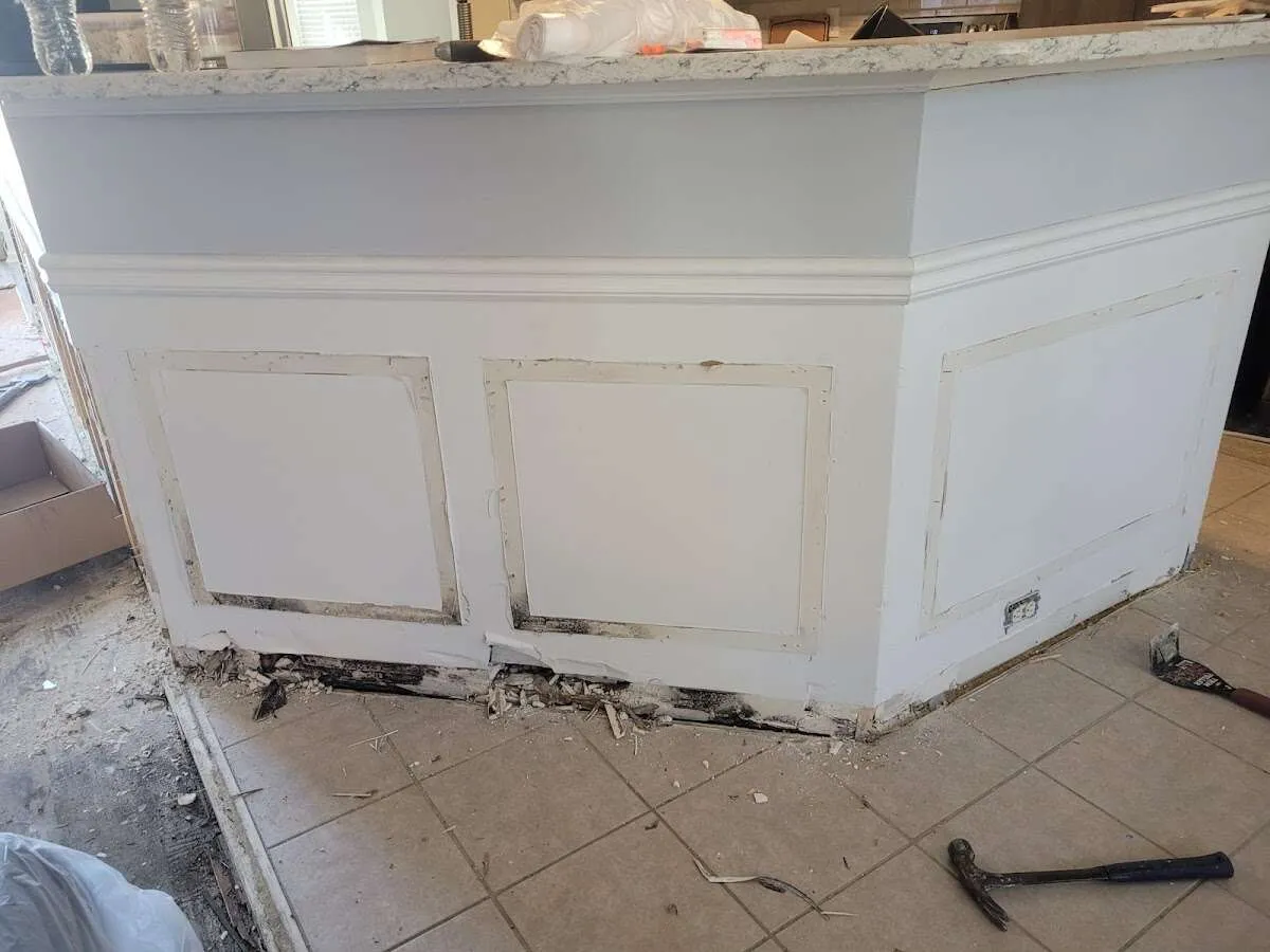 Water damage and mold on kitchen during Storm Damage Restoration in Tyler